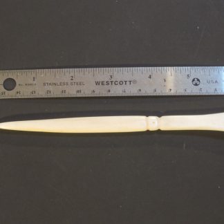 Hand carved bone tool, rounded + flat ends